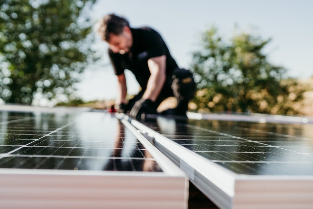 solar panels being installed by solar pros technician